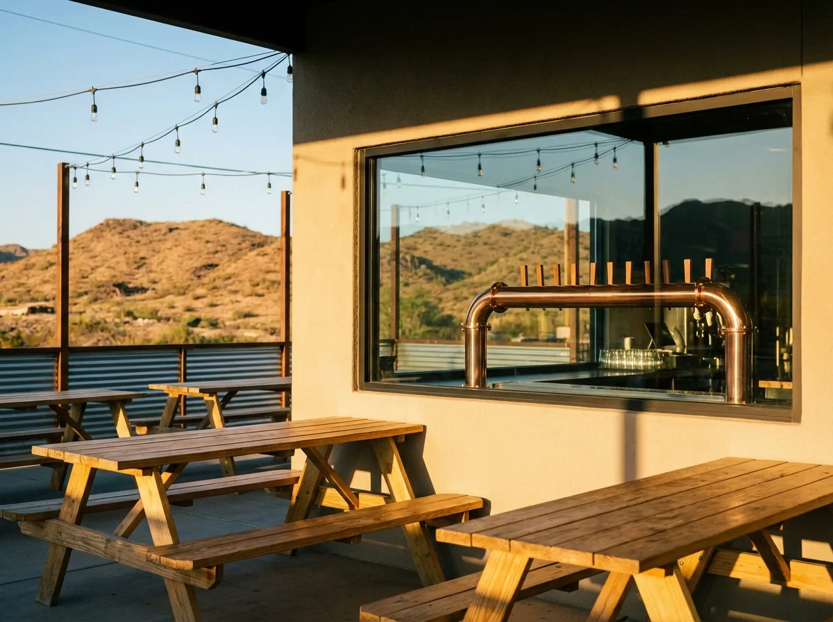 Craft brewery patio with string lights and beer taps in Cottonwood